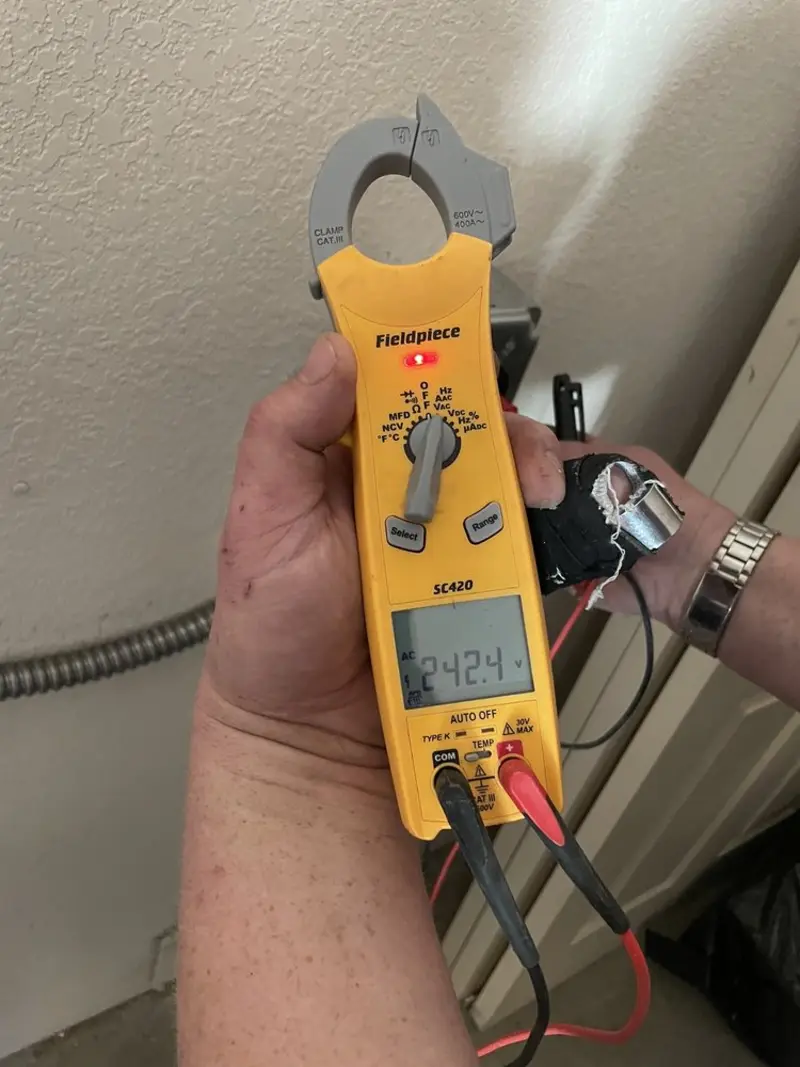Voltage testing with clamp meter during Circuit Breaker Repair in Corinth